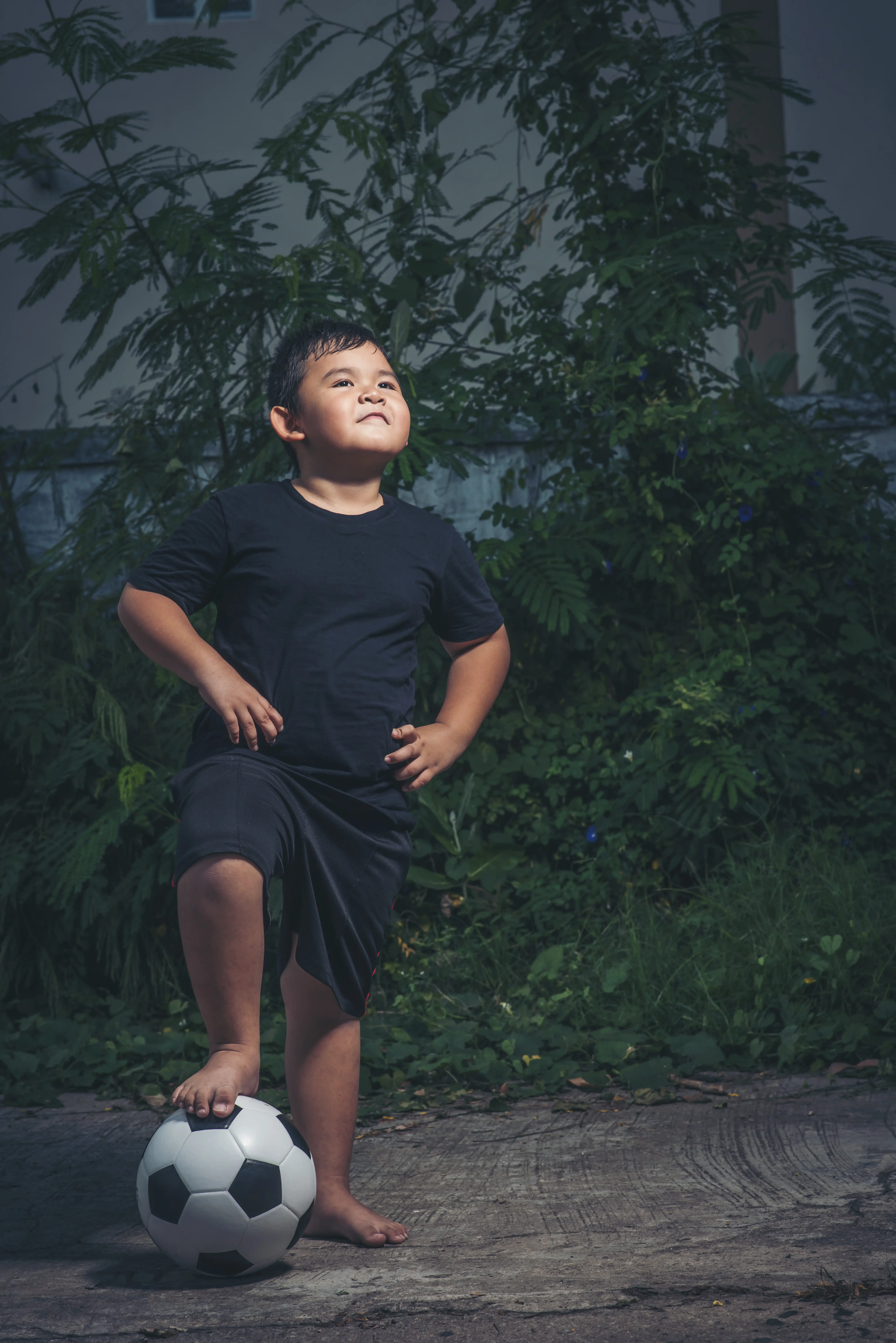Boy Playing Soccer